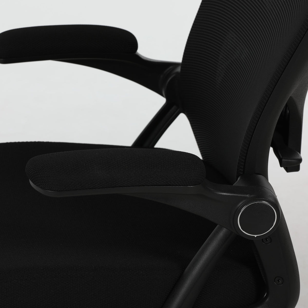 AYLA office chair, close-up of the flip-up armrest