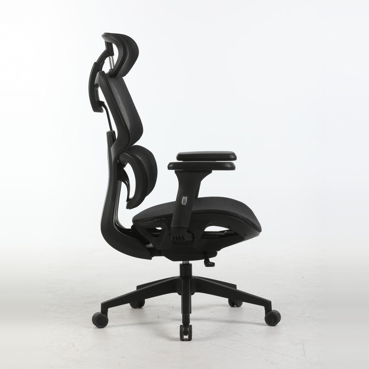SILAS office chair in black, side view showing the recline and lumbar support