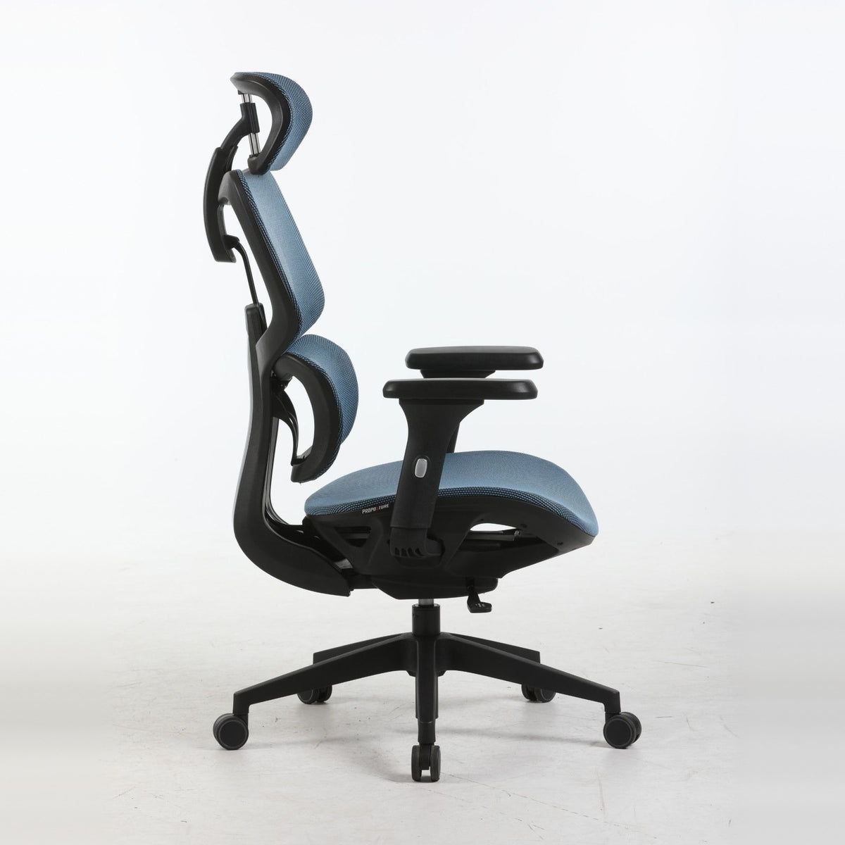 SILAS office chair in blue, side view showing the recline and lumbar support